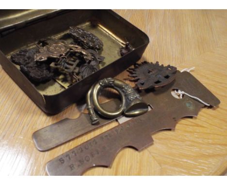1914 Christmas tin together with brass button stick and a few military cap badges and insignia 