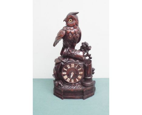Black Forest long eared owl mounted mantel clock with strike, approx 19" high   Condition - Condition is fair.  There are a f