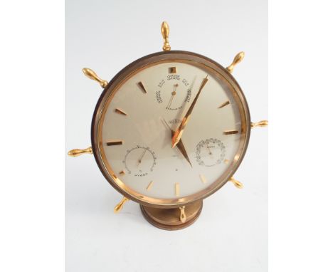 Angelus ships wheel style alarm clock with weather gauge functions c. 1960.  Made for Asprey and signed Asprey to the dial.  