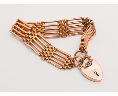 9ct rose gold gate bracelet with heart shaped padlock fastening, weight 22 grams.