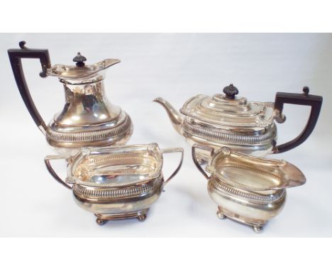 Antique style 4 piece silver tea service with ribbed border and shell cast edges Sheffield 1945.  Approx 60oz troy all in 