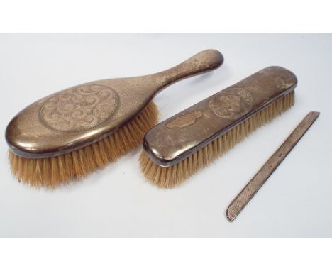 2 silver backed hair brushes and and engine turned comb fitting 
