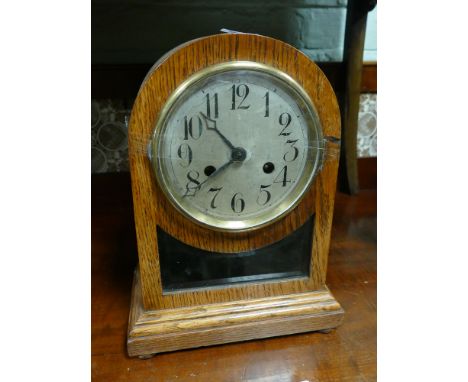 Striking bracket clock in oak case with silver dial 