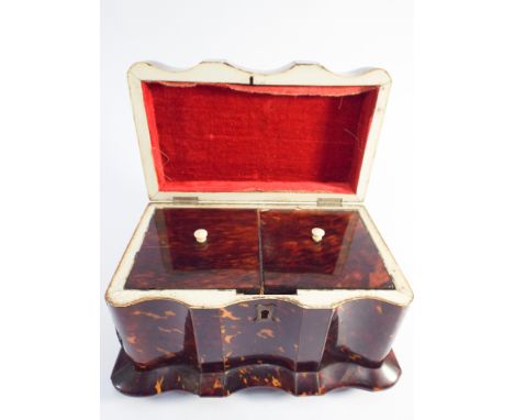 Georgian tortoiseshell and ivory bound tea caddy of shaped form hinged lid opening to reveal two interior sections (filled wi