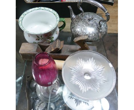 Silver plated embossed kettle, chamber pot, red glass vase, cake stand, rolling pin and a plane 