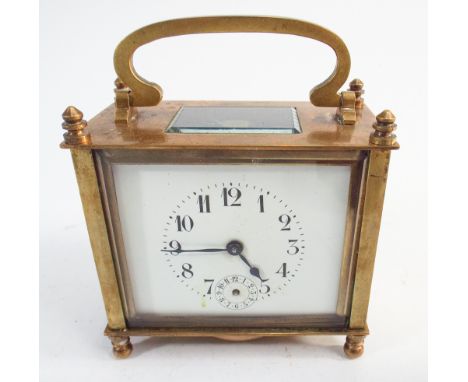 Small French brass carriage clock with white enamel dial 