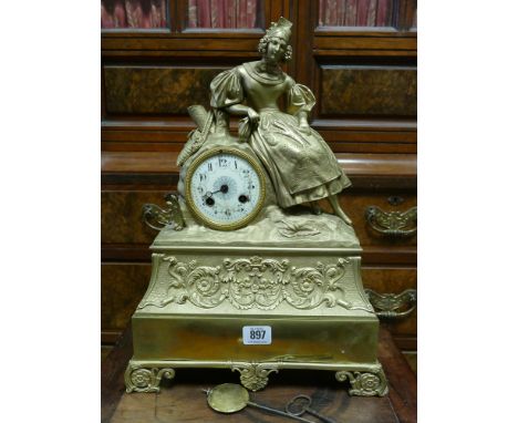 French striking mantel clock in gilt ormolu case with figure mount standing 17" high overall 