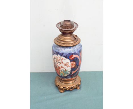 19th century Imari and brass oil lamp 