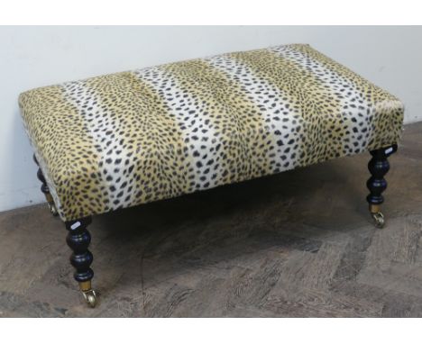 Very large stool with leopard print upholstery 