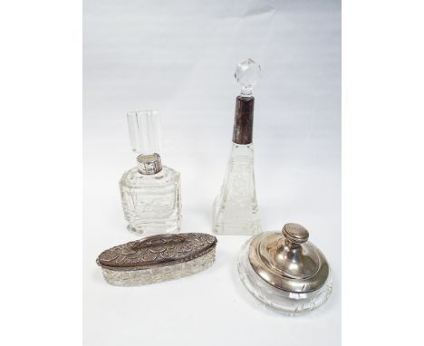 Art deco style cut glass scent bottle with silver collar and other dressing table jars, four in the lot 