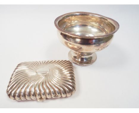 Hallmarked circular sugar basin on pedestal foot and an embossed silver cigarette case, gross weight of 2 items 4.8 oz troy 
