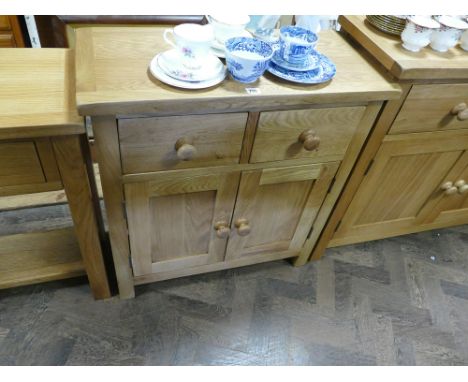 2'6 brand new light oak good quality mini sideboard with 2 drawers and cupboards with bun handles - matches previous lot 