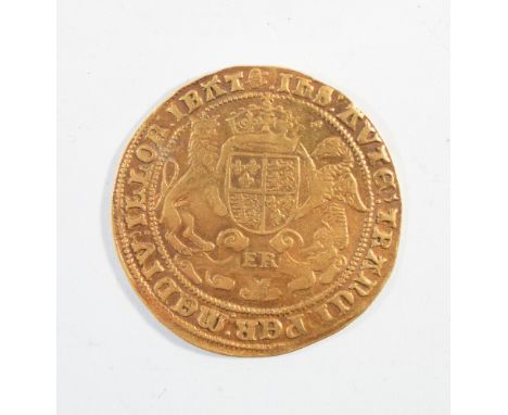 Edward VI sovereign of 1551-53 half length figure of the crowned and holding sword and orb.  The reverse crown shield with su