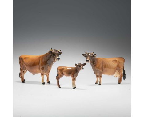 A BESWICK MODEL OF A JERSEY BULL CH. DUNSLEY COY BOY model no. 1422, light brown gloss, 11.9cm high; a Beswick model of a Jer