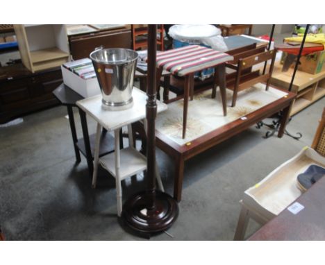 A turned standard lamp 