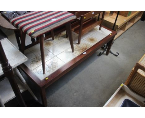 A tile topped coffee table 