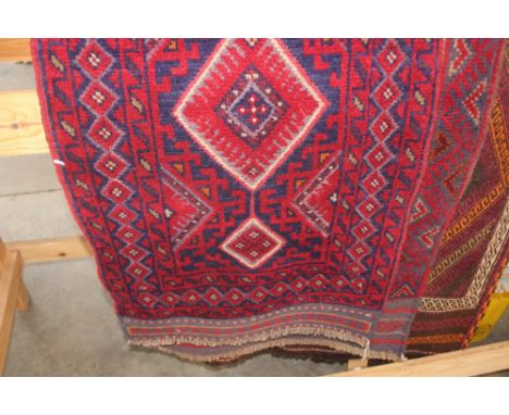 An approx 8'2" x 2' Meshwani runner
