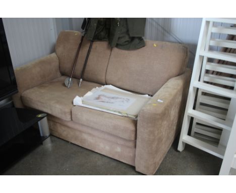 A two seater sofa bed