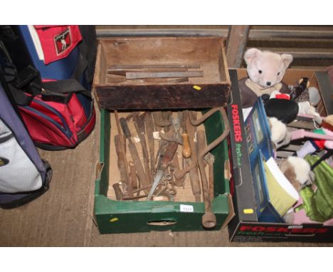 A box of various hand tools