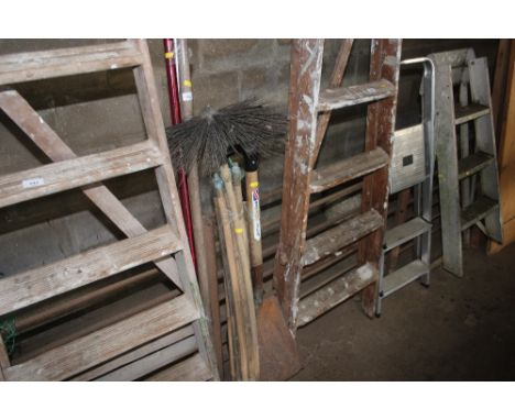 A quantity of long handled gardening tools; chimney sweeping rods etc.
