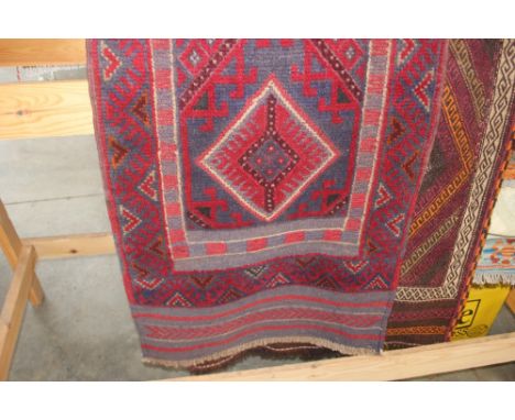 An approx 8'2" x 2'2" Meshwani runner