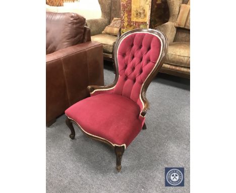 A Victorian style button back lady's chair 