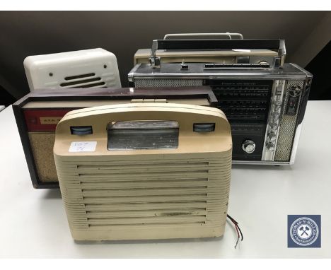 A Stella portable TV set in two-tone case together with an early 20th century Bakelite cased speaker and three radios
