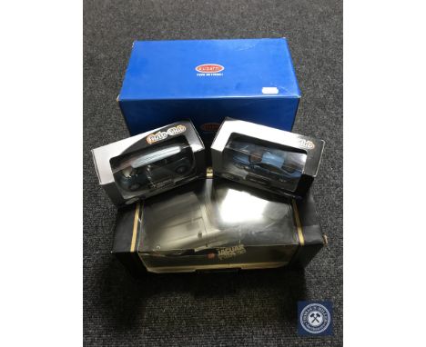 Five boxed die cast vehicles; Burago Ferrari Testarossa, Jaguar Coupe, Bugatti Type 59 and two Auto Club die cast vehicles 
