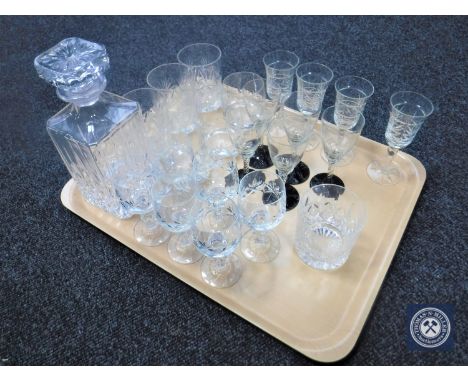 A tray containing assorted glass ware together with a whisky decanter