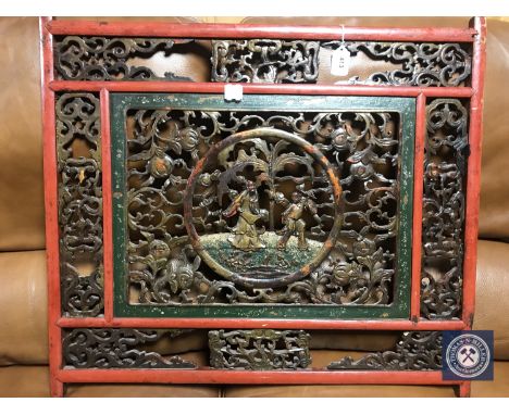 A Chinese carved fretwork panel 