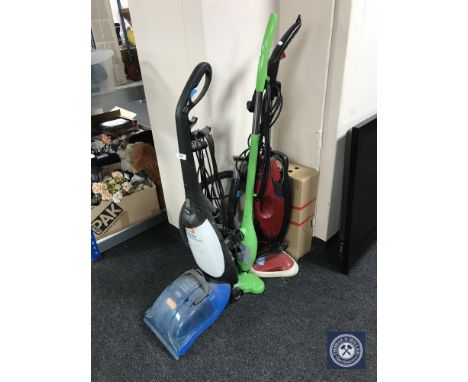 A Vax Rapide carpet washer and two steam mops 