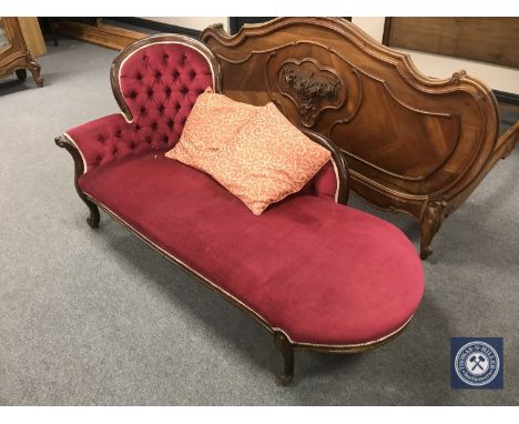 A Victorian style button back chaise longue 