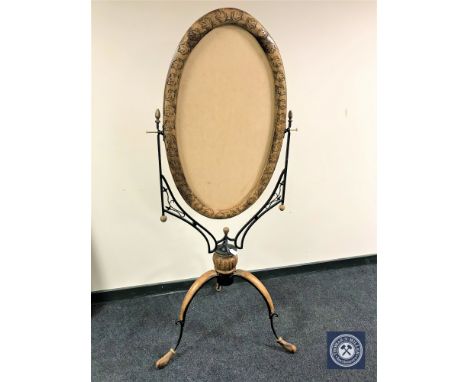 A pine and wrought metal cheval mirror on tripod base (not fitted a glass) 