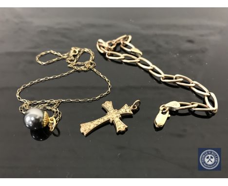 A 9ct gold bracelet, a crucifix and a pearl pendant 8.2g