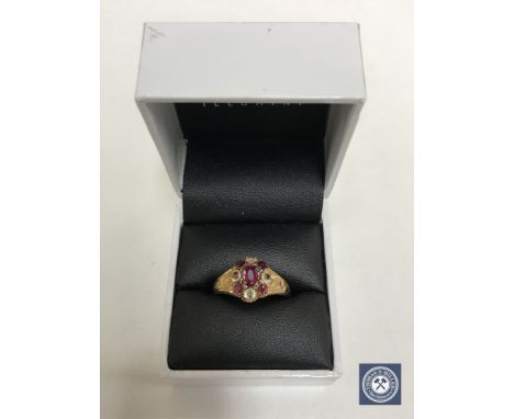 A 15ct gold ruby and citrine ring, size S