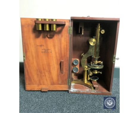 An early 20th century brass microscope by R &amp; J Beck of London, in fitted box
