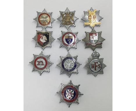 A selection of vintage chromed and enamelled fire service cap badges. To include: Kings crown National Fire Service, Northamp