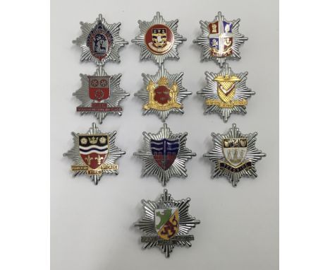 A selection of vintage chromed and enamelled fire service badges. To include: Lindsey Lincolnshire Fire Brigade, Luton, Humbe