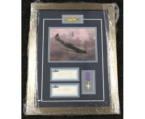 A good quality framed and glazed print of a WW2 Spitfire fighter aircraft, with facsimile miniature DFC medal and gilt RAF ba