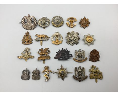 A quantity of WW1, WW2 and later British regimental cap badges, plus some sterling silver WW2 ARP badges. To include: Northam