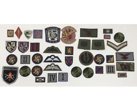 A large and varied selection of embroidered / printed military patches. Mostly modern British corps patches, along with some 