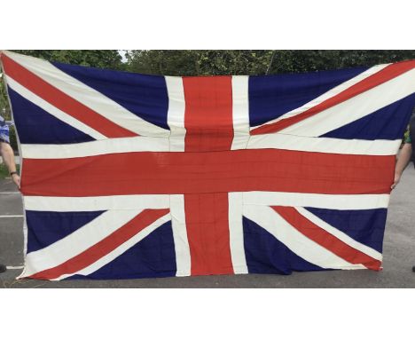 A large sized vintage Union Jack flag (with some calling it a Union Flag if not on a Royal Navy warship), dated 1965 to the s