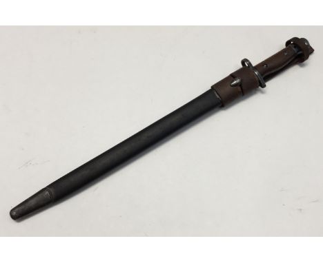 A British WW1 era 1907 pattern Naval issue bayonet with scabbard and scarce 1918 dated leather frog fitted.Marked ‘1 18’ at t