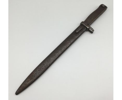 A WW1 German Erzatz bayonet. All steel construction, with open muzzle ring and contoured handle. Button release catch to the 