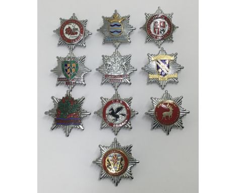 A selection of vintage chromed and enamelled fire service cap badges. To include: Nottinghamshire, Leicestershire & Rutland F