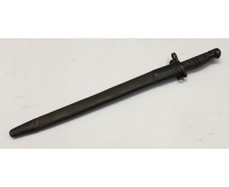 A WW1 era M1917 Remington with scabbard.Standard wooden slab grips, with distinctive double notch to both sides.Blue pommel a