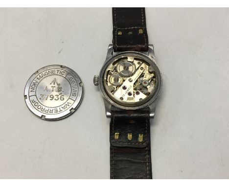 A Swiss gents ‘GMT’ 1940's 15 jewels GMT military wristwatch, comprising a signed silvered round dial with Arabic indices, su