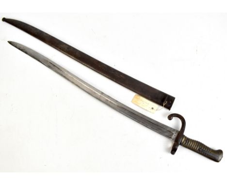 A 19th century French chassepot bayonet with ribbed brass grip and scabbard, length of blade 57cm, overall length 70cm.Additi