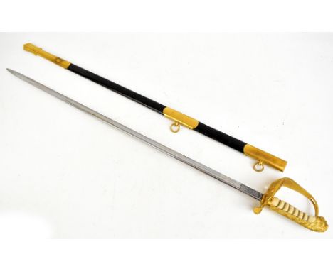 An early 20th century naval officer's sword with shagreen grip, gilt metal guard and Wilkinson blade, length 93cm, with scabb