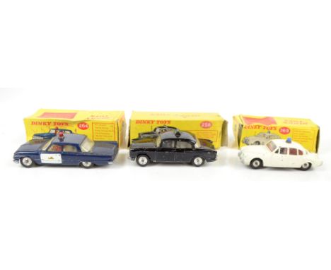 DINKY; a 256 Police Patrol Car, 264 R.C.M.P Patrol Car, and 269 Motorway Police Car, all boxed (two boxes af) (3).Additional 